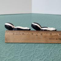 Vintage Ceramic Skunk Salt and Pepper Shaker Set
