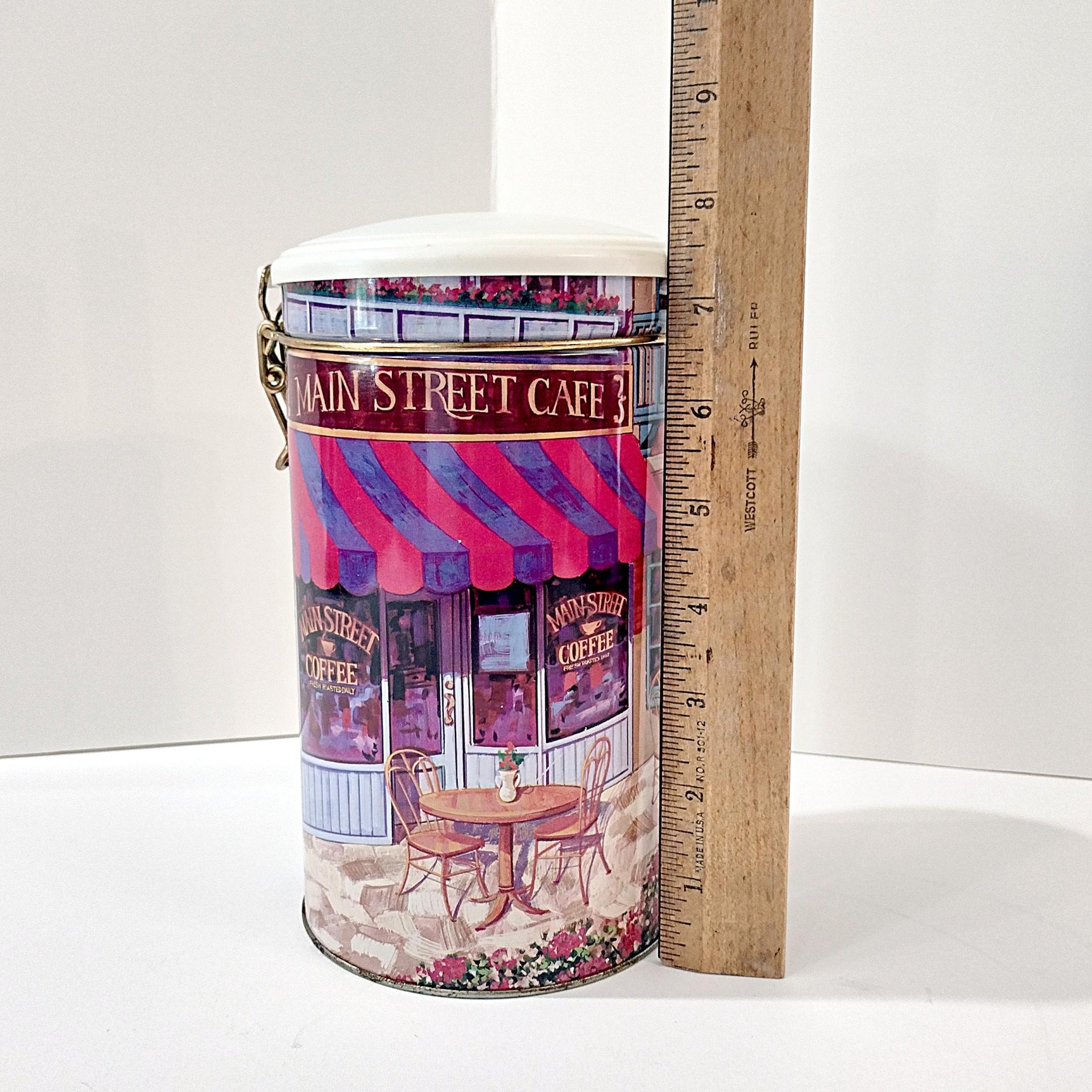 Vintage Main Street Coffee Shop Cylinder Storage Tin with Airtight Clamp Lid, Retro Shop Front Decorative Metal Container