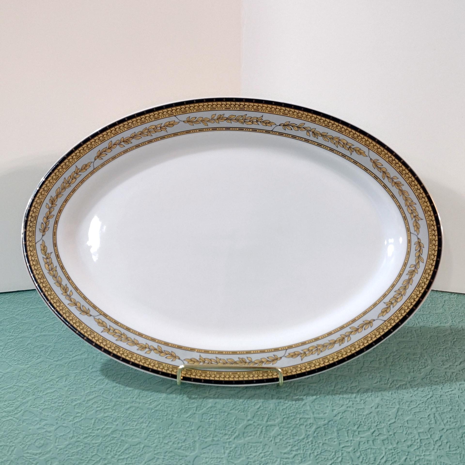Vintage 14 Inch Oval Porcelain Serving Platter with Gold and Black Leaves Design