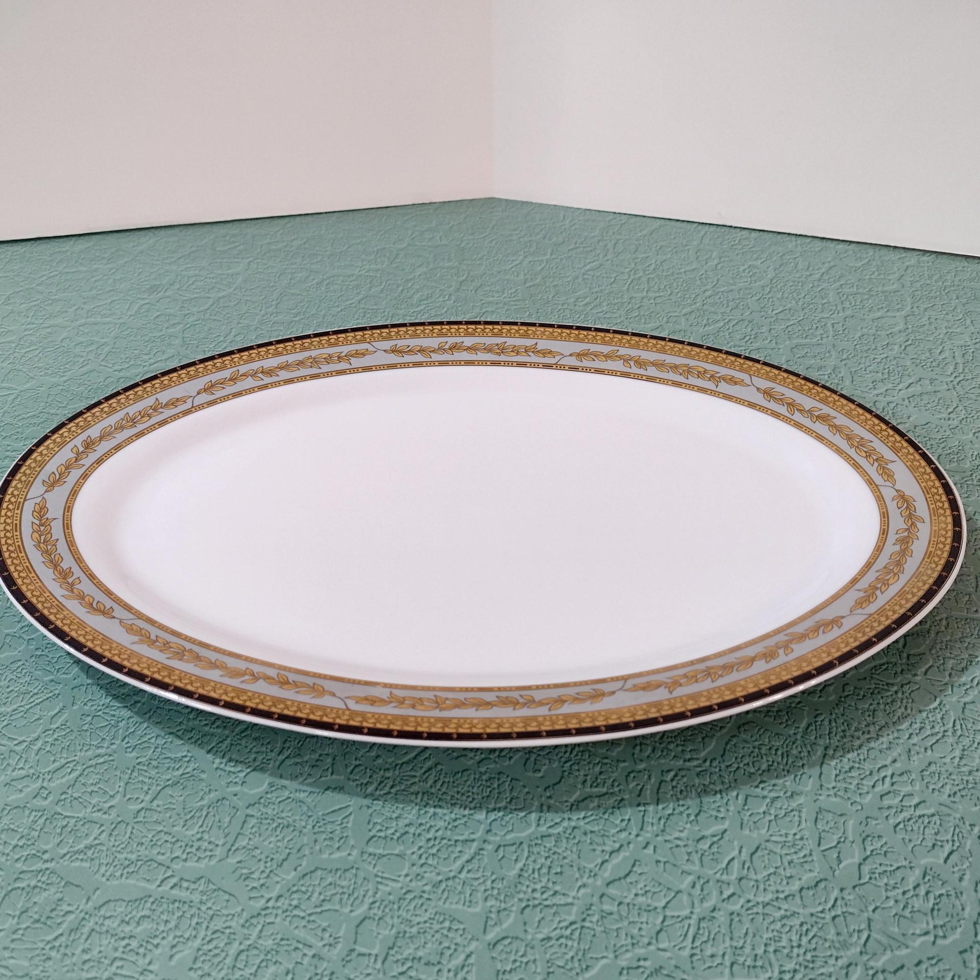 Vintage 14 Inch Oval Porcelain Serving Platter with Gold and Black Leaves Design