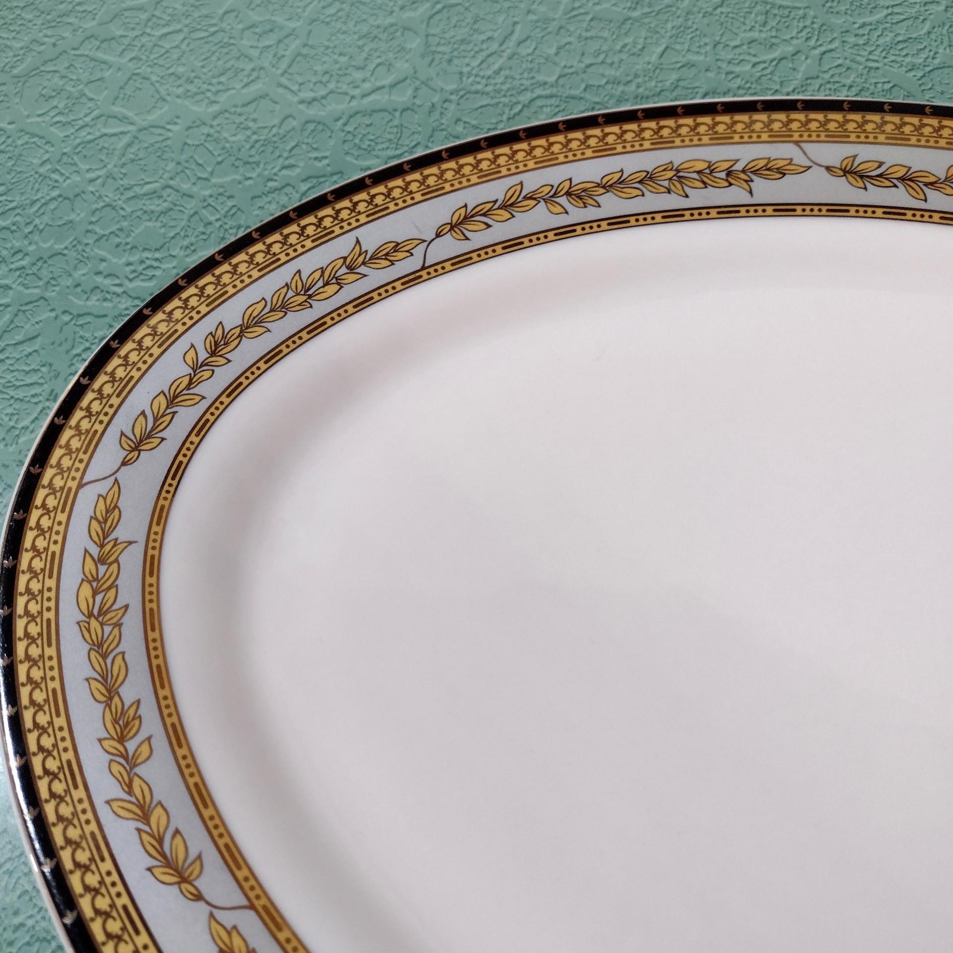 Vintage 14 Inch Oval Porcelain Serving Platter with Gold and Black Leaves Design