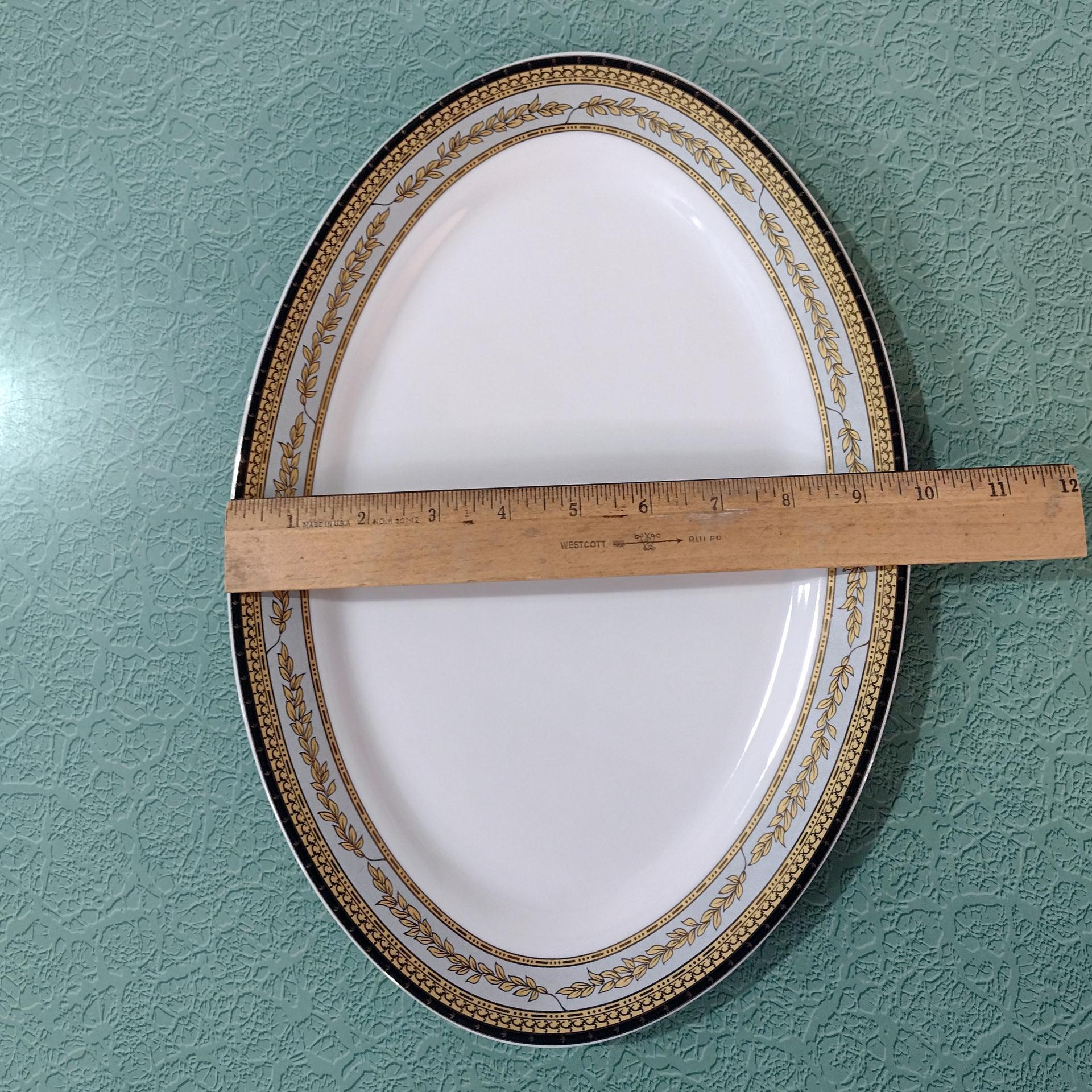Vintage 14 Inch Oval Porcelain Serving Platter with Gold and Black Leaves Design
