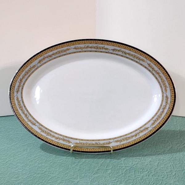 Vintage 14 Inch Oval Porcelain Serving Platter with Gold and Black Leaves Design
